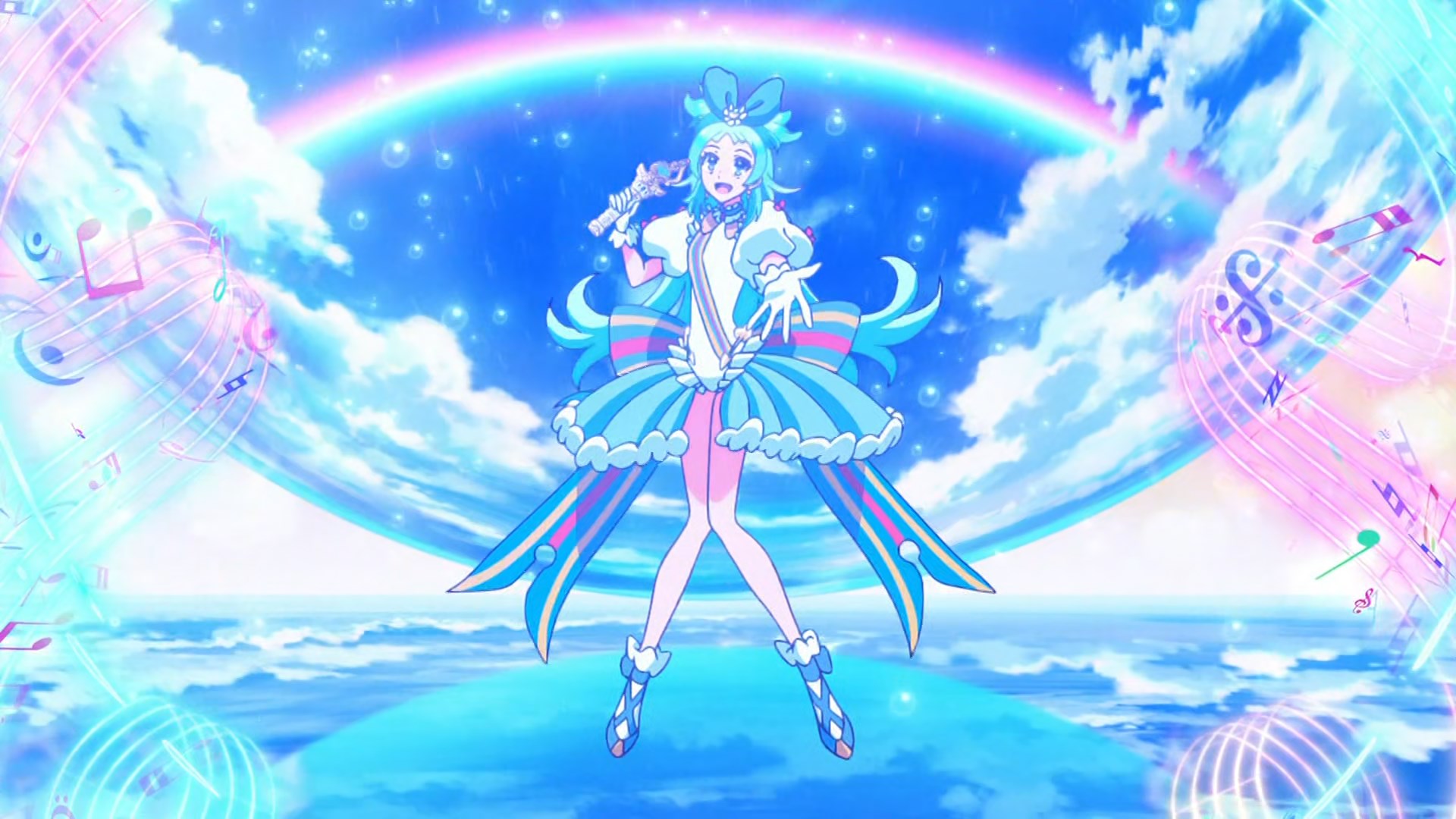 A blue haired magical girl, clad in light blue with a rainbow behind her, clasps a magical microphone in one hand, stretching the other out to the viewer. Musical notations float beside her.